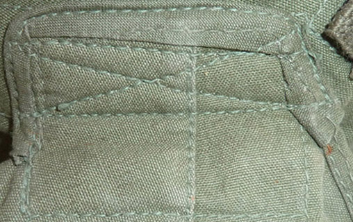 Fixation des bavolets par couture. Fixation des bavolets par couture.