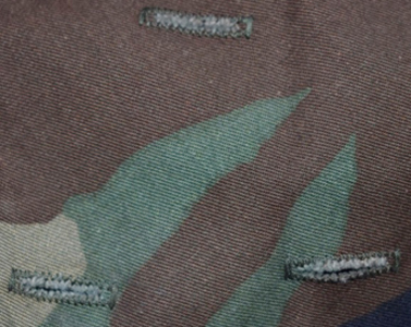 Boutonnières pour camouflage supplémentaire. Boutonnières pour camouflage supplémentaire.