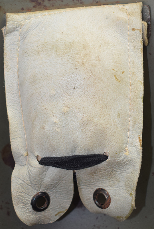 Envers patte de coiffe.